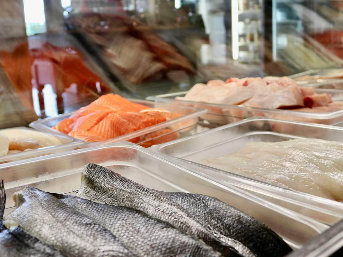 assorted seafood in a case